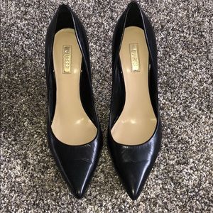 GUESS black heels with gold tip heel
